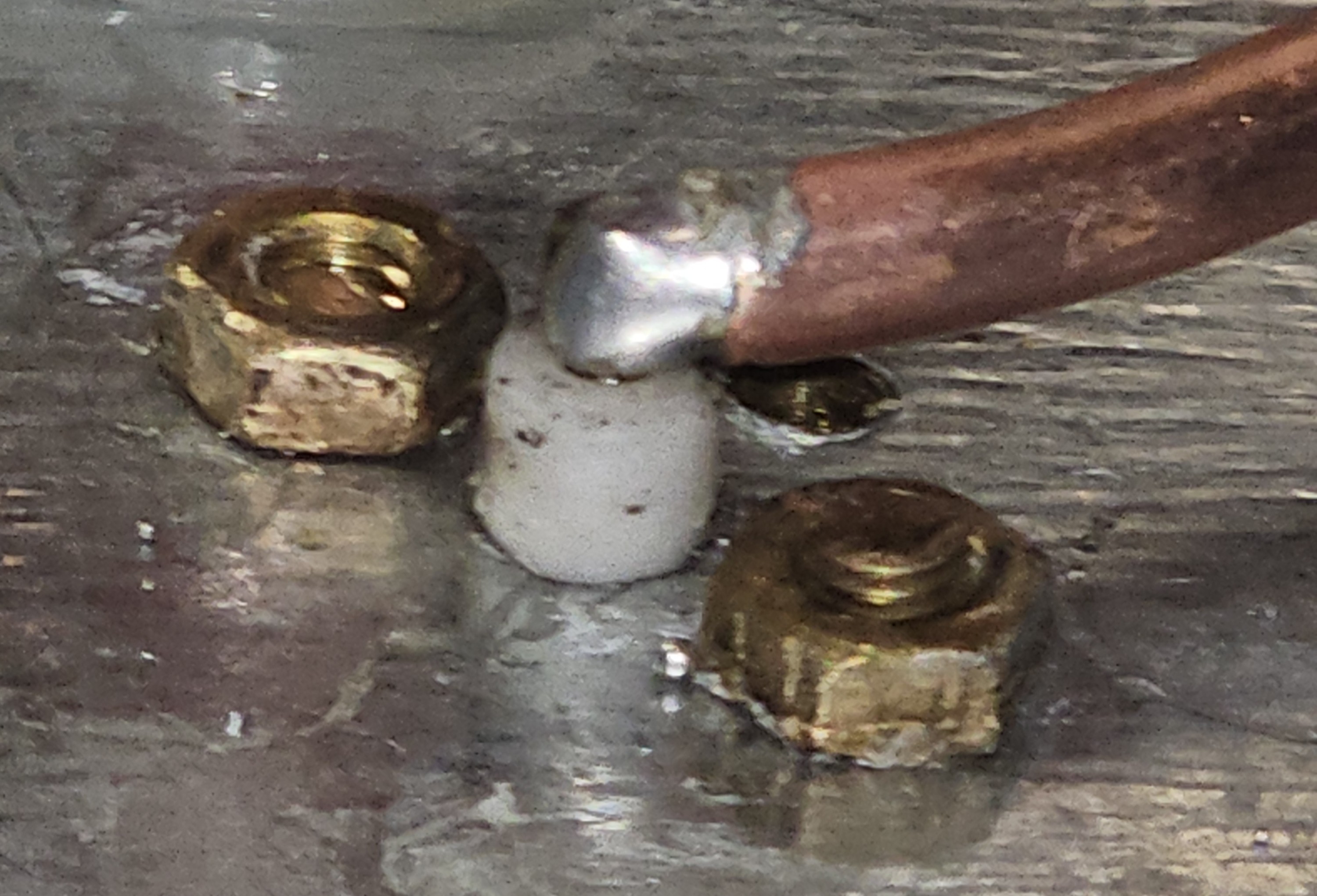 A picture showing the soldering of the SMA port